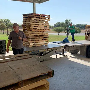 Document Solutions recycles wooden pallets.